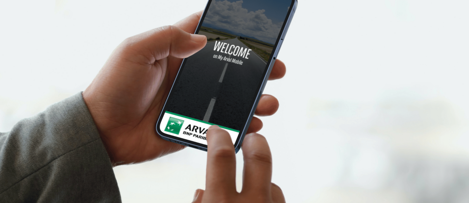 Hands holding phone with My Arval Mobile App open